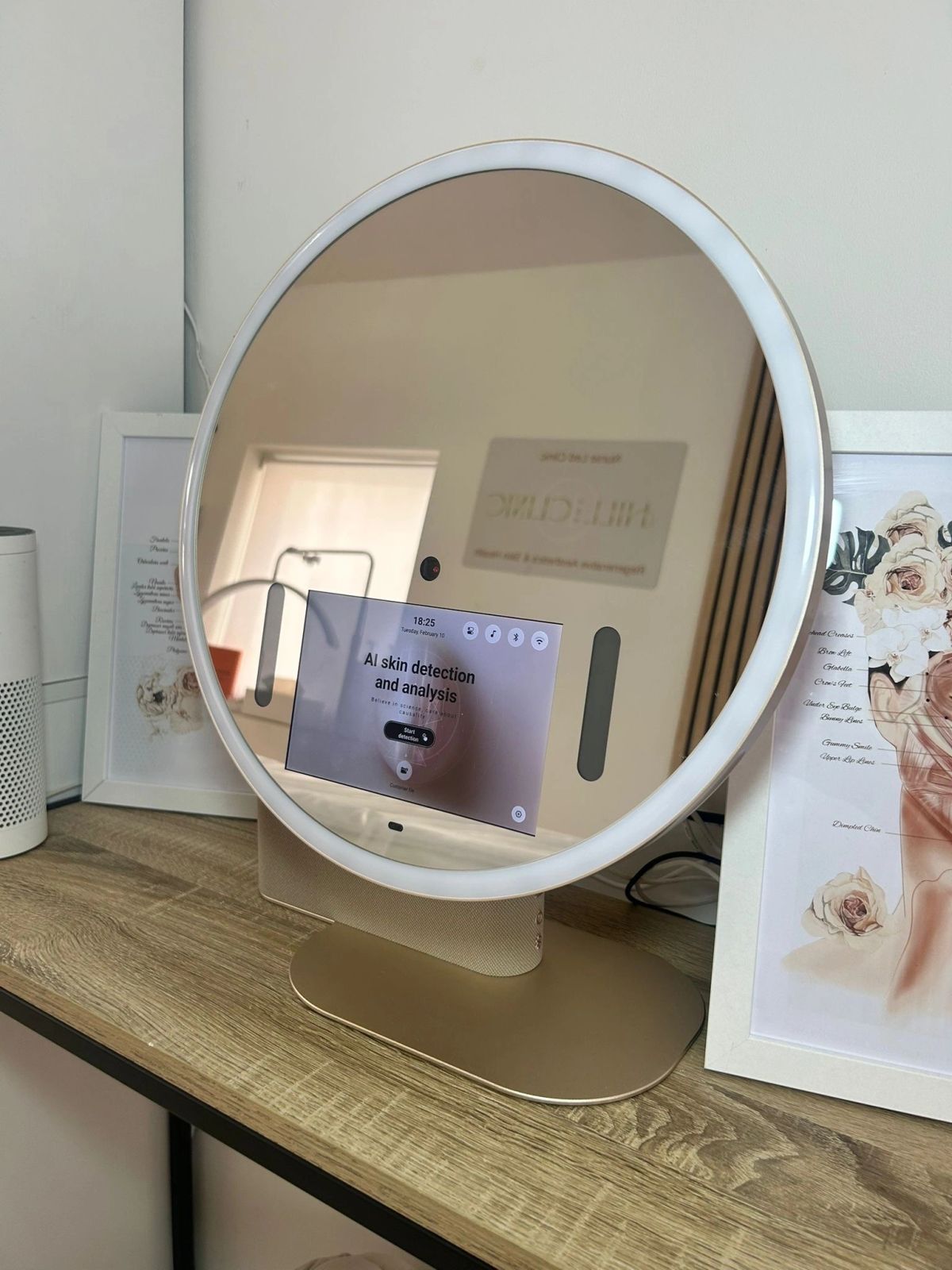 AI Smart Mirror on a clinic counter showing its skin detection and analysis screen
